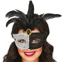 Silberne und schwarze venezianische Maske mit Federn