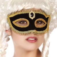 Venezianische Maske mit schwarzem und goldenem Dekor